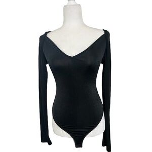 NWOT Free people intimately black body suit with back cross over